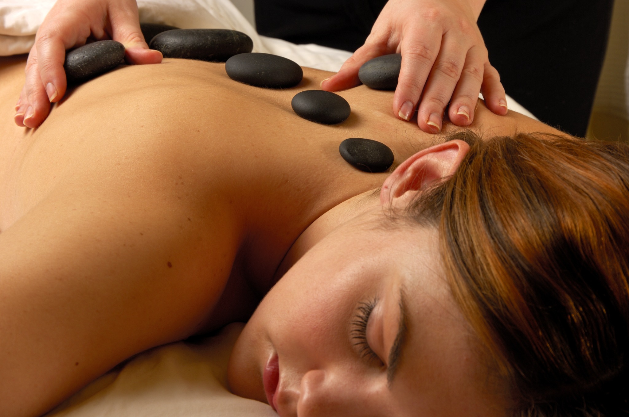 Hot-stone massage ritual at Spa Lotus in Darwin